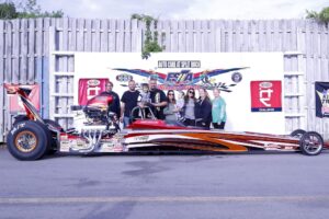 Vince Musolino wheels his ride to the Winner’s Circle at ESTA Dragstrip